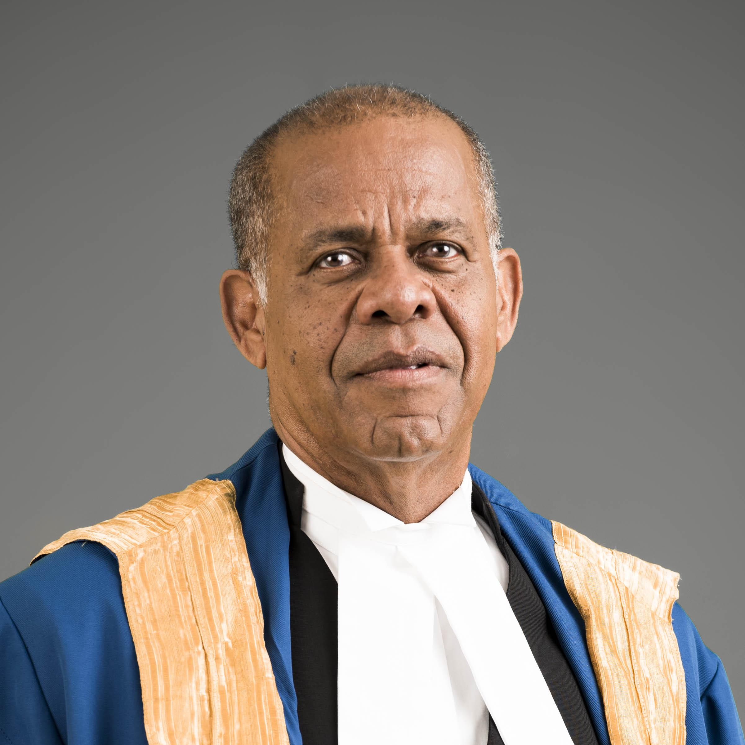 The Honourable Mr. Justice Denys Barrow